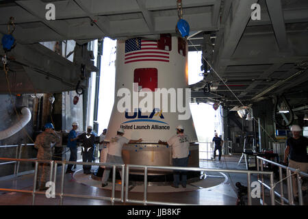 The United Launch Alliance Centaur upper stage is mated to an Atlas V booster rocket at the Cape Canaveral Air Force Station Vehicle Integration Facility to travel to the launch complex July 13, 2017 in Cape Canaveral, Florida. The rocket is scheduled to launch the Tracking and Data Relay Satellite, TDRS-M in early August. Stock Photo