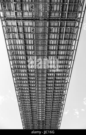 The amazing construction of Brooklyn Bridge New York from below Stock Photo