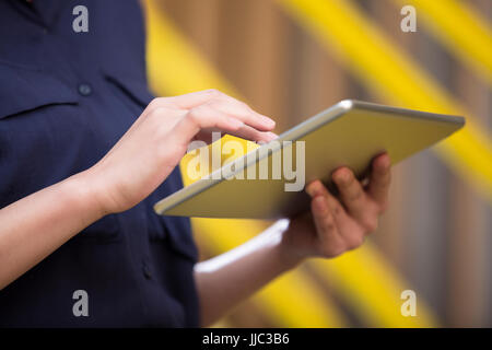 Businesswoman using digital tablet Stock Photo