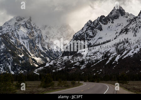 The Jenny Lake Loop Road winding toward Cascade Canyon in the Teton Mountains. Grand Teton National Park, Wyoming Stock Photo