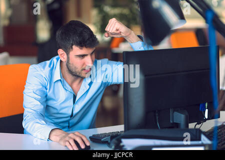 Freelance programmer working in startup office Stock Photo