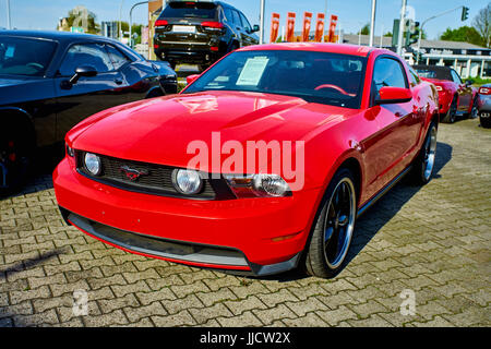 MOENCHENGLADBACH, GERMANY - APRIL 30, 2017: Ford Mustang GT Coupe  in red color Stock Photo