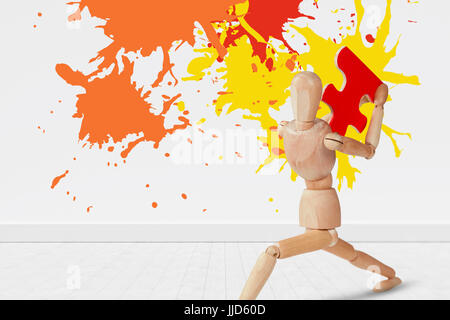 Colourful paint splashes against gray flooring and wall Stock Photo