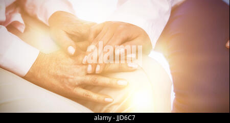 Close-up of female doctor consoling a patient at the hospital Stock Photo