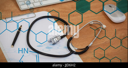 Science graphic against stethoscope with clipboard by keyboard and mouse on table Stock Photo