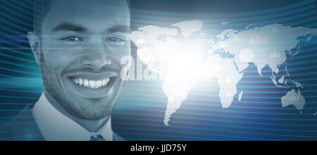 Portrait of smiling businessman  against defocused image of illuminated lighting equipment Stock Photo