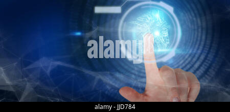 Close-up of cropped hand against house shapeon  circuit board Stock Photo