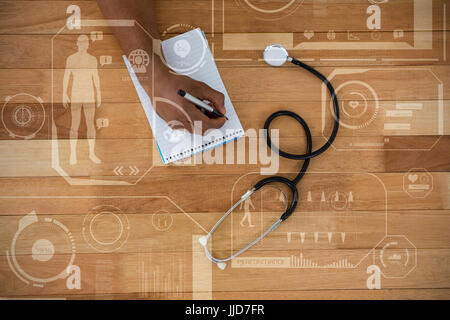 Digitally generated image of health fitness against cropped hand of doctor writing prescription on notepad Stock Photo