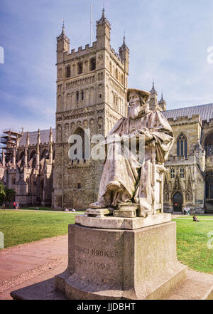 20 June 2017: Exeter, Devon, England, UK - The statue of Richard Hooker, writer and theologian, outside Exeter Cathedral. Stock Photo