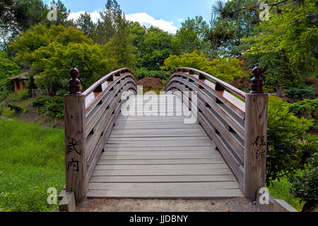 Wooden Foot Bridge to Tsuru Island Japanese Garden in Gresham Oregon City Park Stock Photo