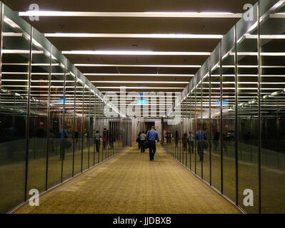 Singapore - Jun 14, 2017. People walking on Lobby of Changi Airport in Singapore. Changi serves more than 100 airlines flying to some 380 cities in ab Stock Photo