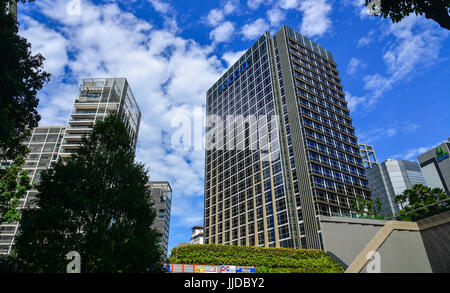 Singapore - Jun 14, 2017. Modern apartments at sunny day in Singapore. The estimated population of Singapore was 5,535,000 people in 2015. Stock Photo