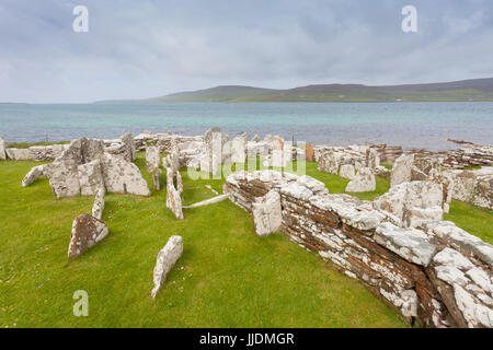 The Broch of Gurness is an Iron Age broch village on the northwest coast of Mainland Orkney in Scotland Stock Photo