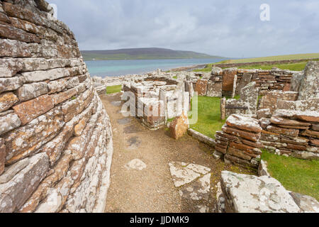 The Broch of Gurness is an Iron Age broch village on the northwest coast of Mainland Orkney in Scotland Stock Photo