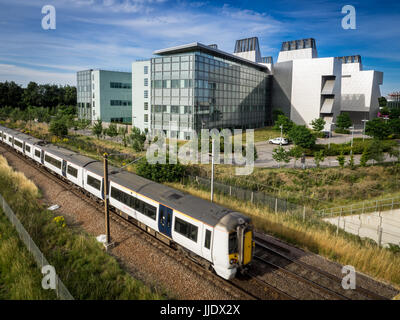 Biomedical - MRC Molecular Biology Lab / Train - A London to Cambridge Train  passes the MRC Laboratory of Molecular Biology, Cambridge UK. Stock Photo