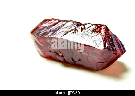 Red natural Geology crystals on white background. Red blood salt  Sodium ferrocyanide crystals Stock Photo