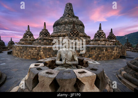 Buddha Statue at Borobudur, Magelang, Yogyakarta, Central Java, Indonesia Stock Photo