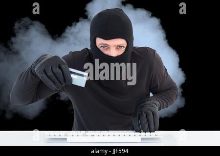 Digital composite of hacker Stock Photo