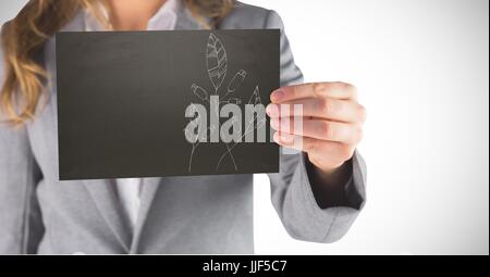 Digital composite of Business woman mid section with black card showing white leaf doodle against white background Stock Photo