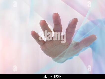 Digital composite of Hand reaching spread out with sparkling light bokeh background Stock Photo