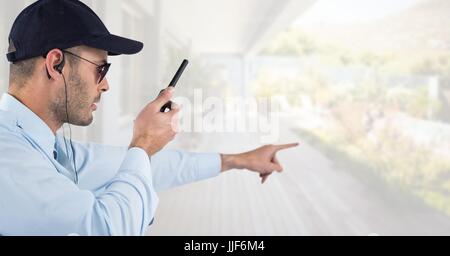 Digital composite of Security man outside bright background house porch Stock Photo