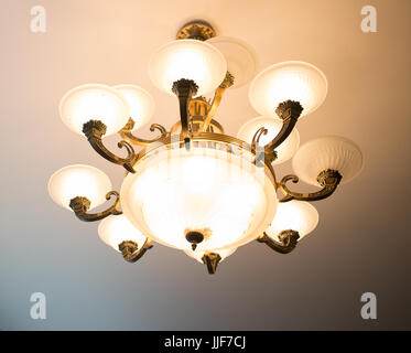 Home interiors Chandelier on ceiling(turn on the light) Stock Photo