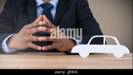 Digital composite of Cut out car with businessman Stock Photo