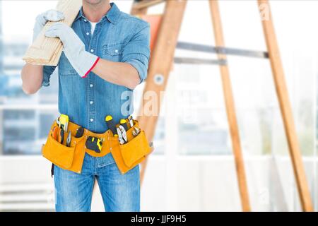 Digital composite of carpenter at work Stock Photo