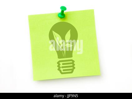 Digital composite of Green lightbulb graphic on green sticky note Stock Photo