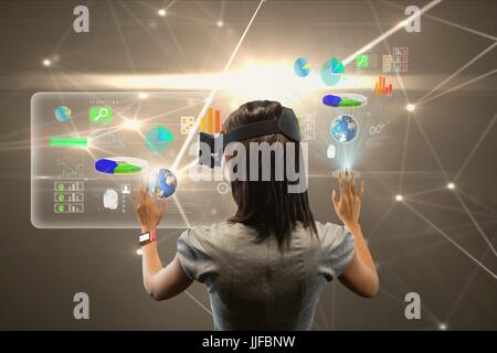 Digital composite of lady with virtual reality headset Stock Photo