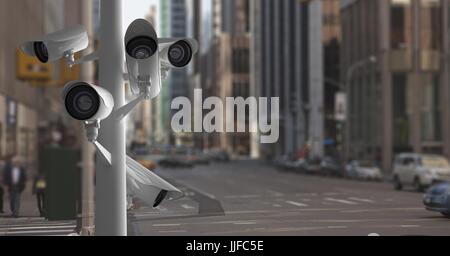 Digital composite of CCTV cameras against roads in city Stock Photo