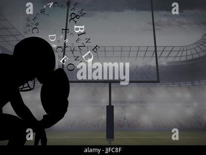 Digital composite of football player thinking silhouette in the field with text around head Stock Photo
