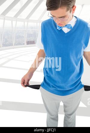 Digital composite of sad young man with empty pocket Stock Photo