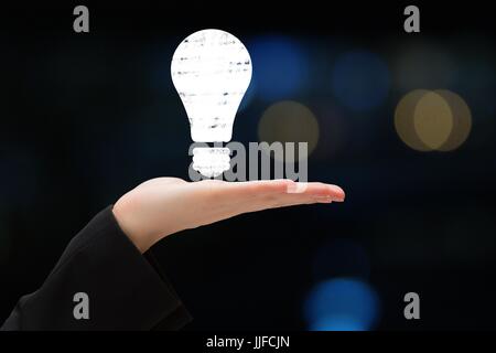 Digital composite of bulb on hands Stock Photo