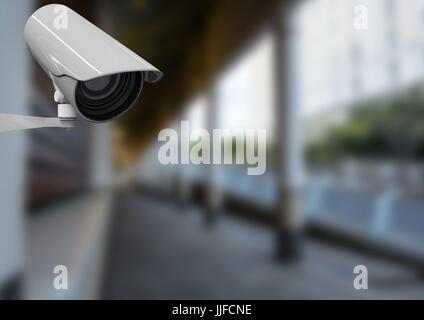 Digital composite of CCTV controlled a blurred street during the day Stock Photo