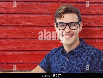 Digital composite of hipster with glasses and own praisred wood background Stock Photo