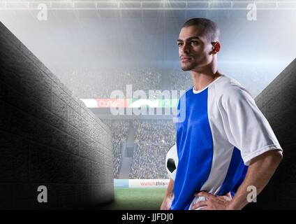 Digital composite of soccer player prepare to go out to the field Stock Photo