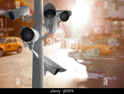 Digital composite of cctv stick. street with flares and lights Stock Photo