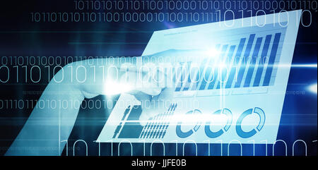 Close-up of cropped hand pointing against blue technology design with binary code Stock Photo