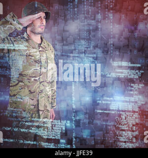 Confident military soldier saluting against graphic image of blocks Stock Photo