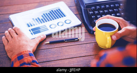 Blue graphics on white background against a man is drinking coffee Stock Photo