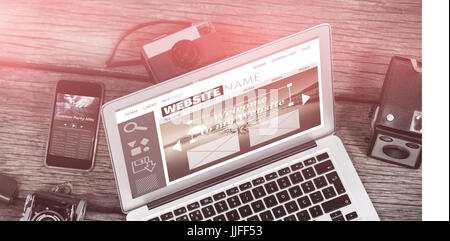 Composite image of build site interface against laptop with cameras and mobile phone table Stock Photo