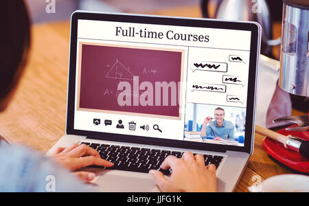 Composite image of full-time courses against woman using laptop at office Stock Photo