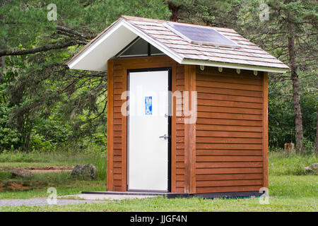 Male and Female outdoor restroom facilities with handicapped accessibility. Stock Photo