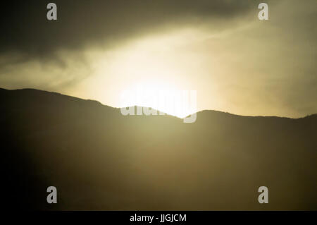 Sunrise coming over a mountain in Utah. Stock Photo