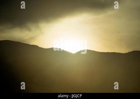 Sunrise coming over a mountain in Utah. Stock Photo