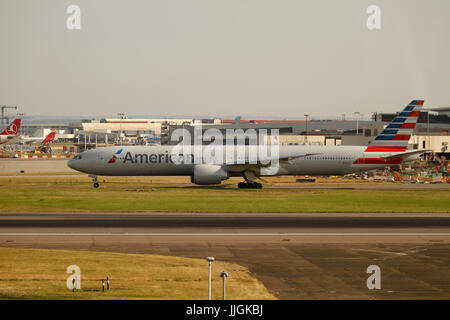 N736AT American Airlines Boeing 777-323(ER) The Boeing 777 is a family of long-range wide-body twin-engine jet airliners developed and manufactured by Stock Photo