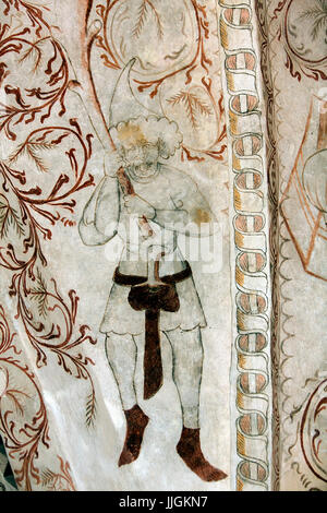 Danish nedieval religious fresco in Undloese Church depicting a soldier painted by the Isefjord Master from aoeund year 1450 A.D. Stock Photo