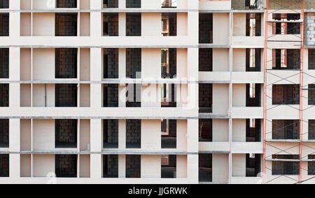 Facade of a building under construction with no windows Stock Photo