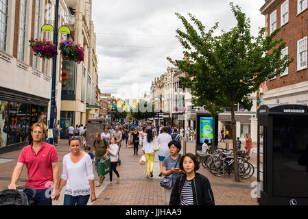 People walking and shopping in Clarence Street , the main pedestrianised shopping street in Kingston Upon Thames, London , UK Stock Photo